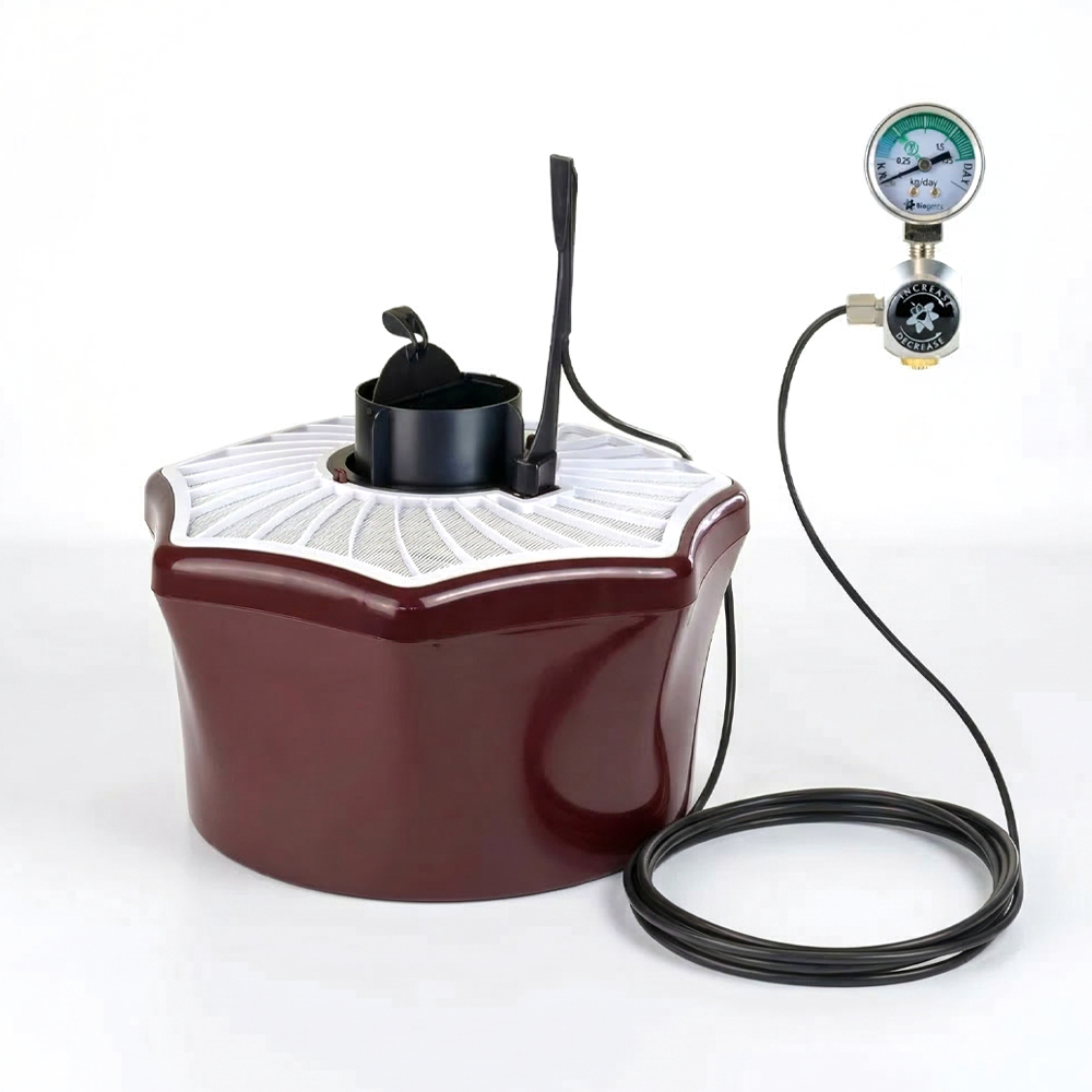 A cylindrical Biogents BG-Mosquitaire active mosquito trap featuring a white and black plastic housing, a top intake funnel, and an internal mesh catch bag.