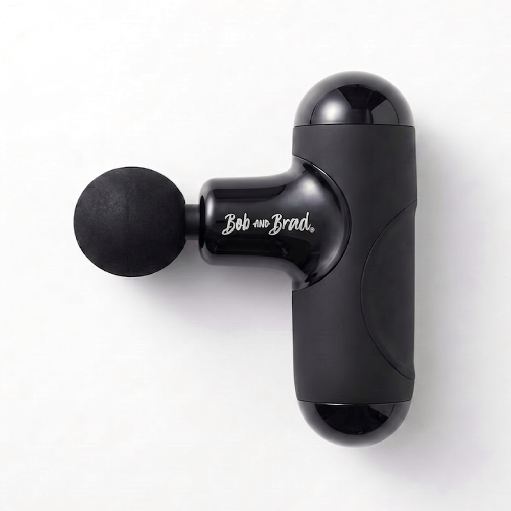 Photo of the compact Bob and Brad Q2 Mini massage gun, featuring a whisper-quiet motor and ultra-light design, ideal for travel or home muscle relief.