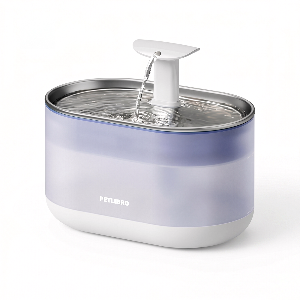 Photo of the PETLIBRO upgraded pet water fountain, with a semi-transparent body, stainless steel drinking bowl, quiet pump, and easy-to-clean design for sensitive cats and small dogs.