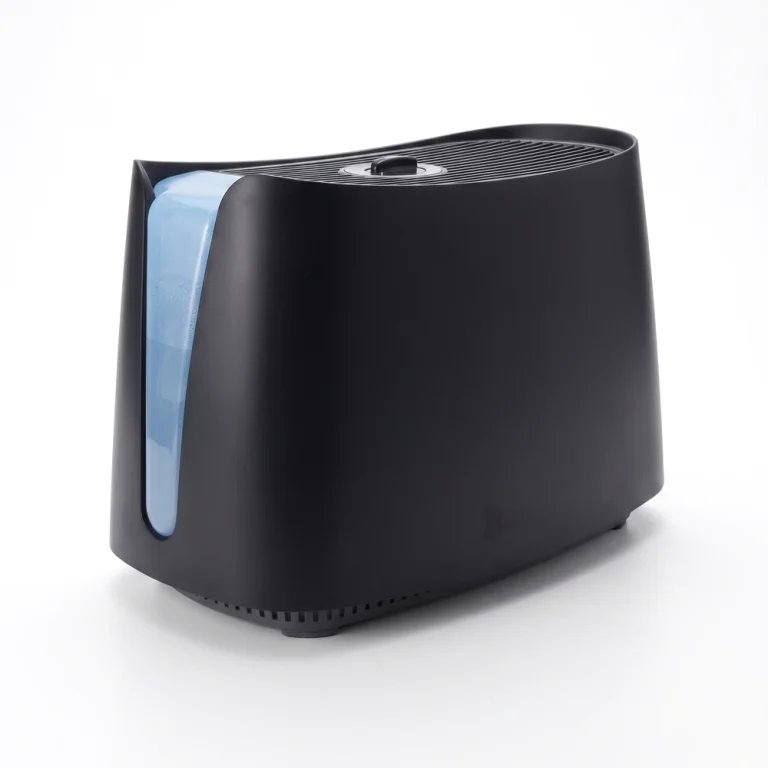 Studio shot of the Honeywell HCM-350B humidifier showing its black utilitarian plastic body and blue water tank, resembling medical equipment.