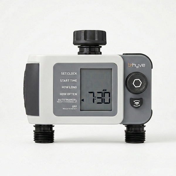 A product shot of the Orbit B-hyve smart hose faucet timer, showing its digital LCD display, grey housing, and threaded hose connections.